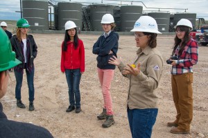 Students from the Praxis Lab receiving a tour of the Anadarko natural gas fields outside of Vernal, Utah during their fall 2014 field trip.