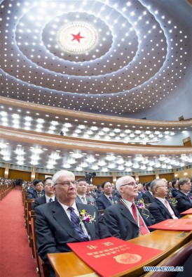 University of Utah chemist Peter J. Stang (on aisle) sits in China’s Great Hall of the People on Jan. 8, 2016, during a ceremony in which he was awarded that nation’s International Science and Technology Cooperation Award.