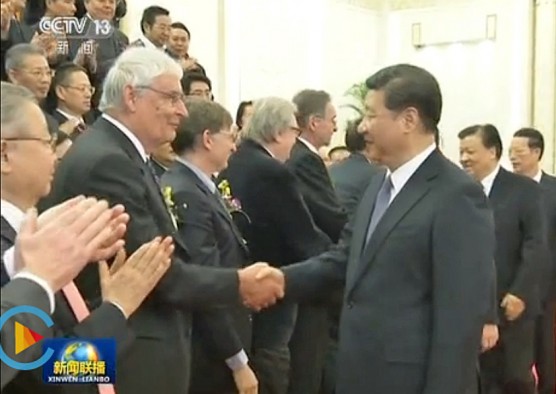 After receiving and International Science and Technology Cooperation Award on Jan. 8, 2016, in China’s Great Hall of the People, University of Utah chemist Peter J. Stang, left, shakes hands with Chinese President Xi Jinping.