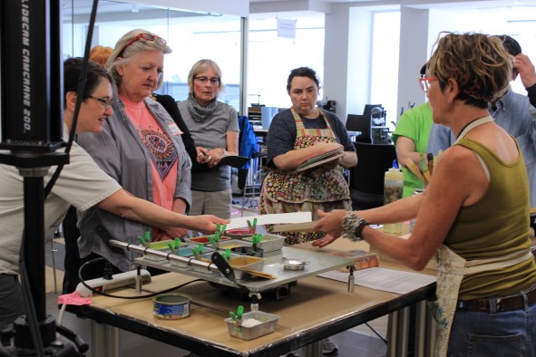 Workshop participants get hands-on experience and learn from experts in book arts and printmaking.