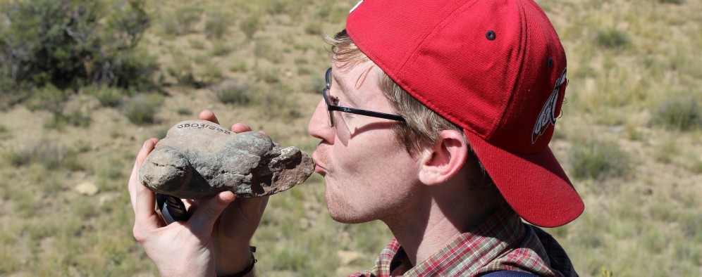 Adam Huttenlocker identifies a small therapsid fossil at one of the study sites.