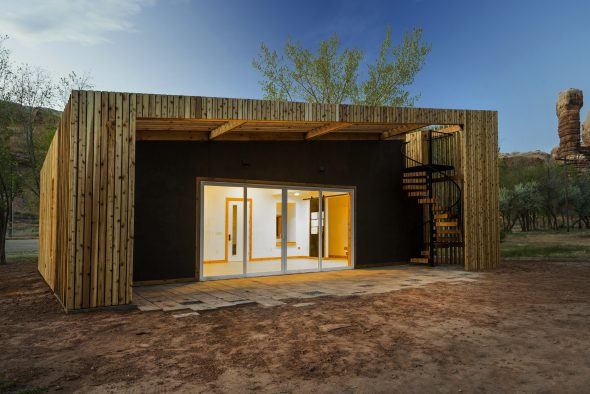 Cedar Hall, an 850-square-foot structure with an open floor plan, white walls for multi-use, rain water collection and a soon to be installed solar energy system.