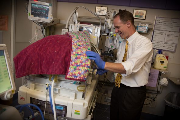 Christian Con Yost, M.D., associate professor of pediatrics at the University of Utah School of Medicine in the neonatal intensive care unit (NICU).