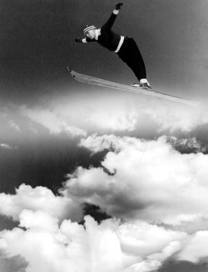 Ski jumping medalist Alf Engen, airborne, 1930s. From the Alf K. Engen photograph collection.